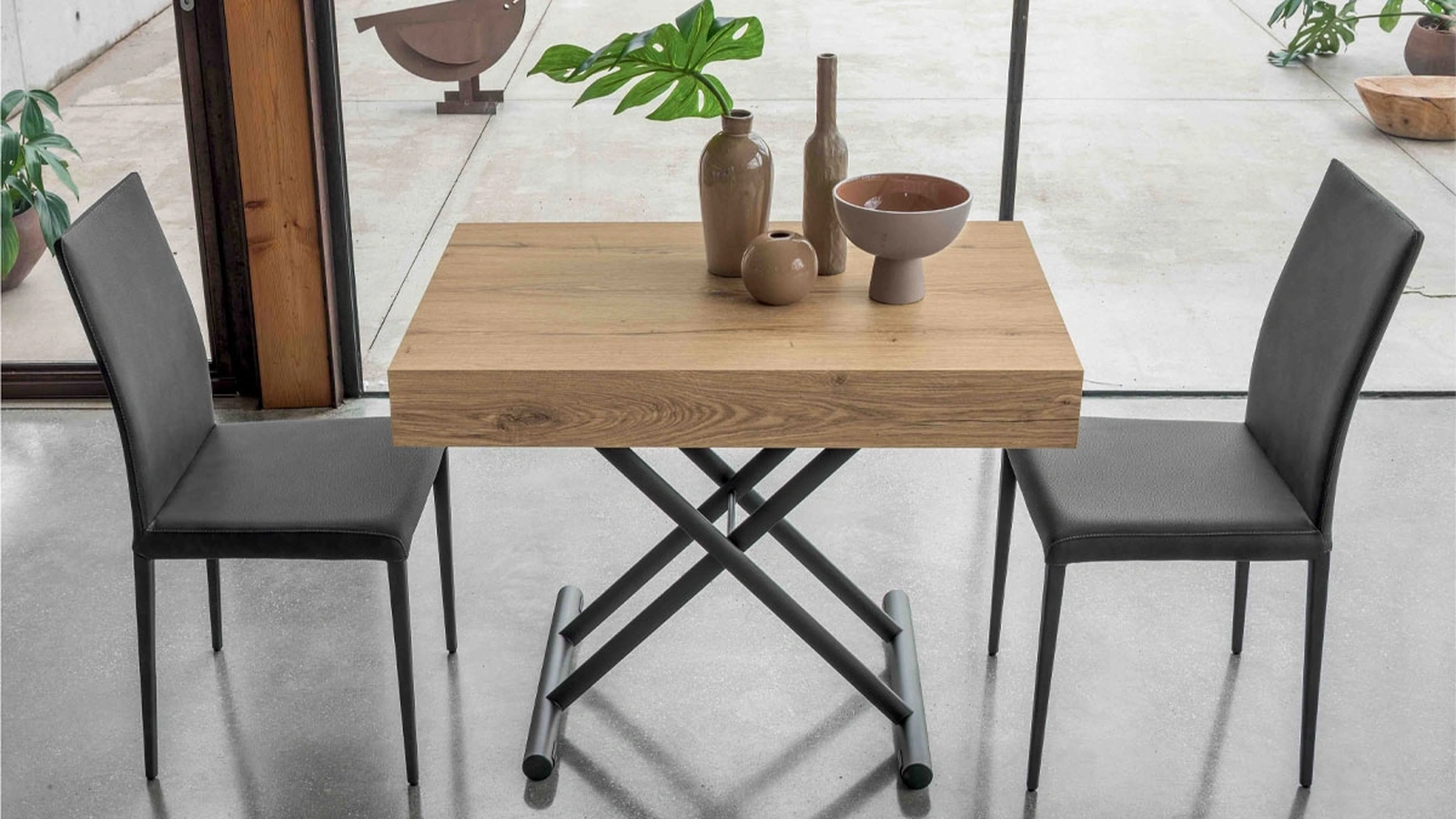 Compact transformable coffee table by Altacom