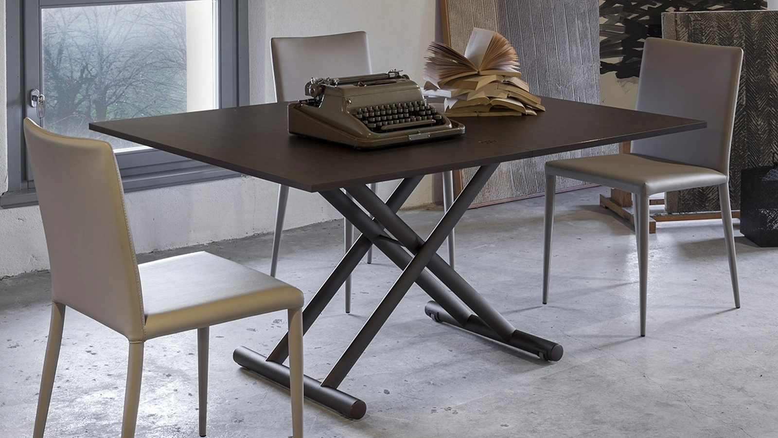Transformable Universe coffee table with melamine top and metal base by Altacom