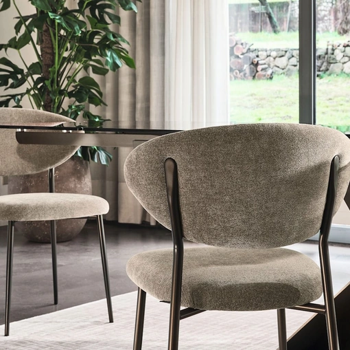 Manta upholstered fabric chair by Calligaris