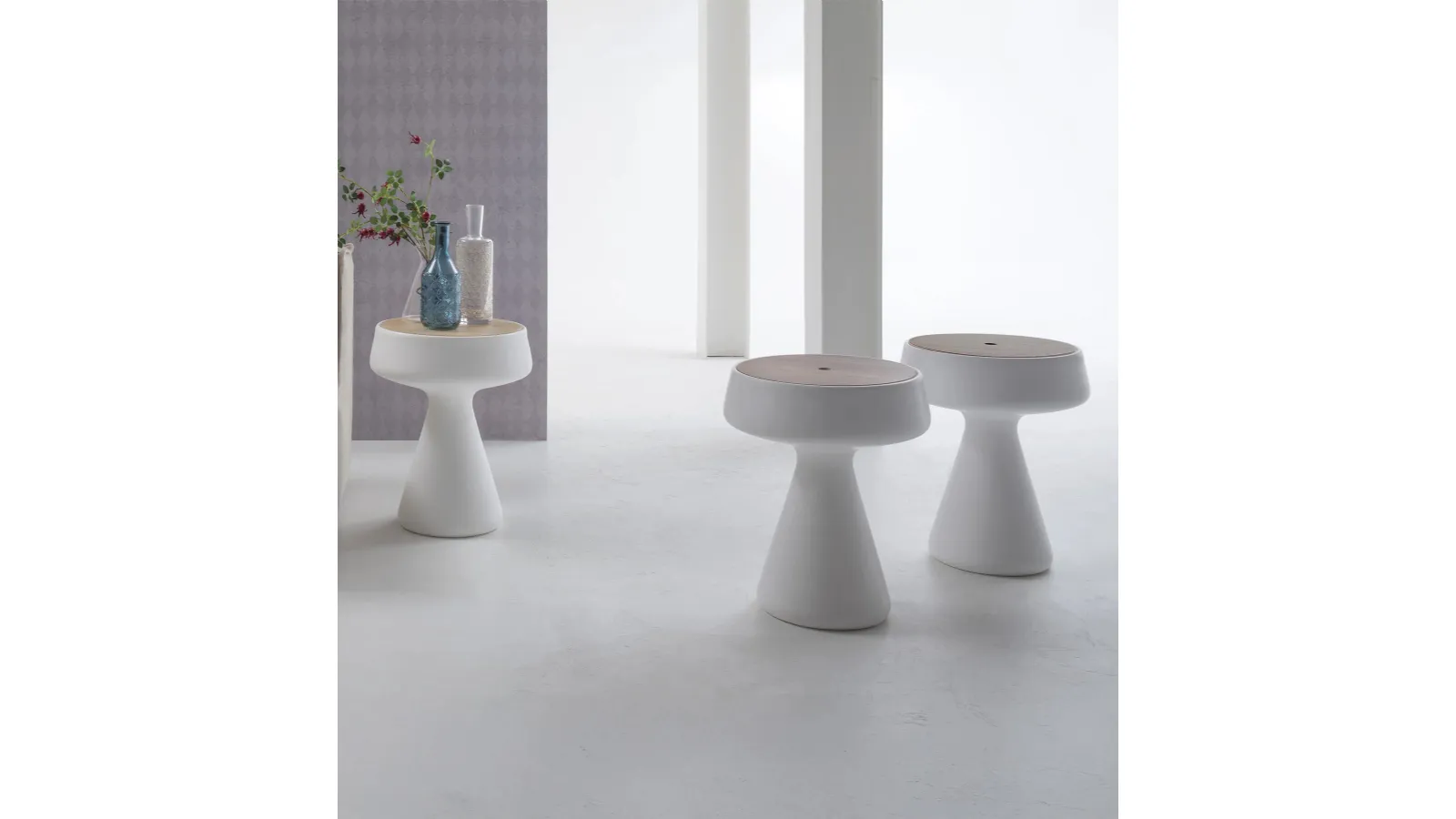 Design coffee table Maki in polyethylene with wooden top by Tonin Casa.