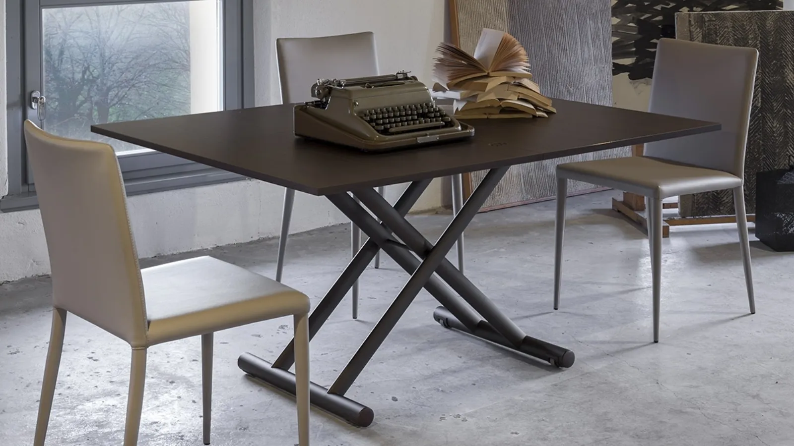 Transformable Universe coffee table with melamine top and metal base by Altacom