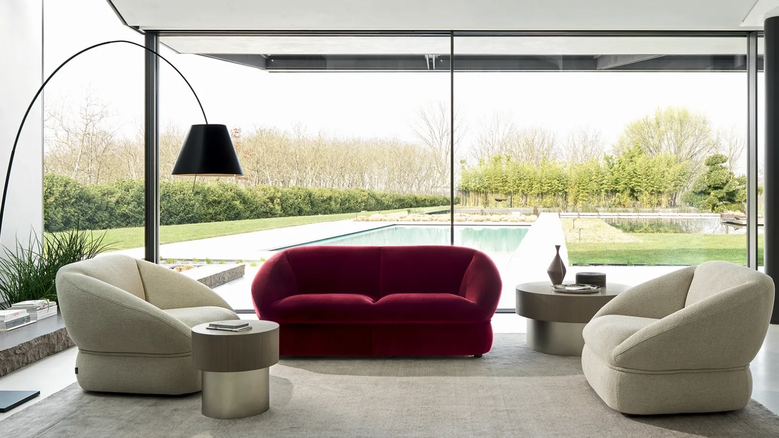 High-backed armchair upholstered in fabric by Ditre Italia.