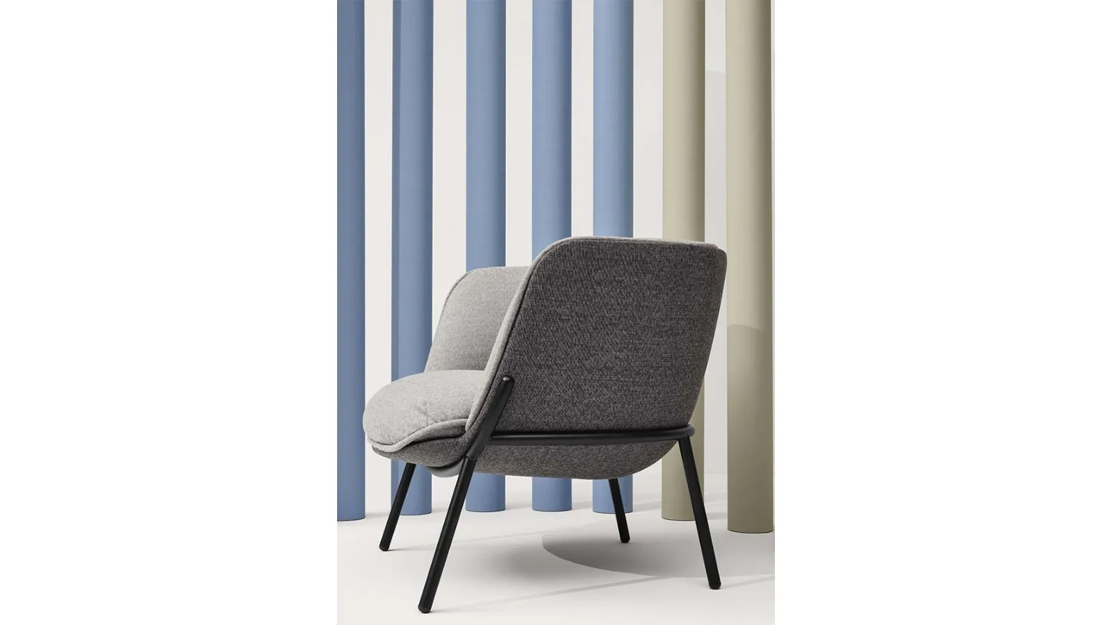 BomBom 4 Leg Armchair in padded fabric and steel legs by Infiniti