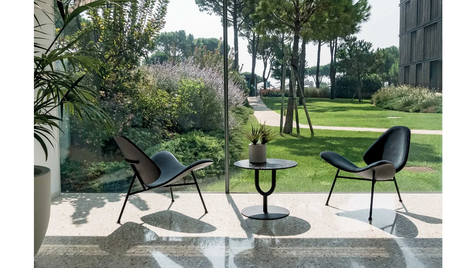 Design armchair Kram in padded fabric by Infiniti.