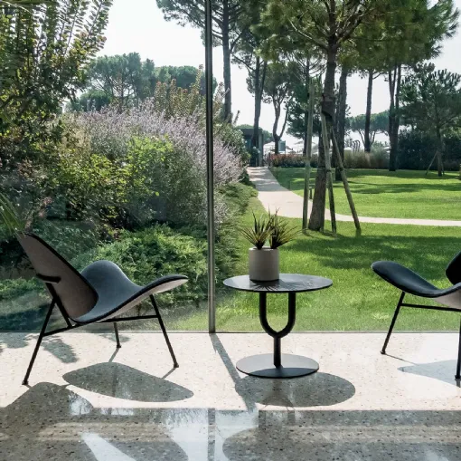 Design armchair Kram in padded fabric by Infiniti.