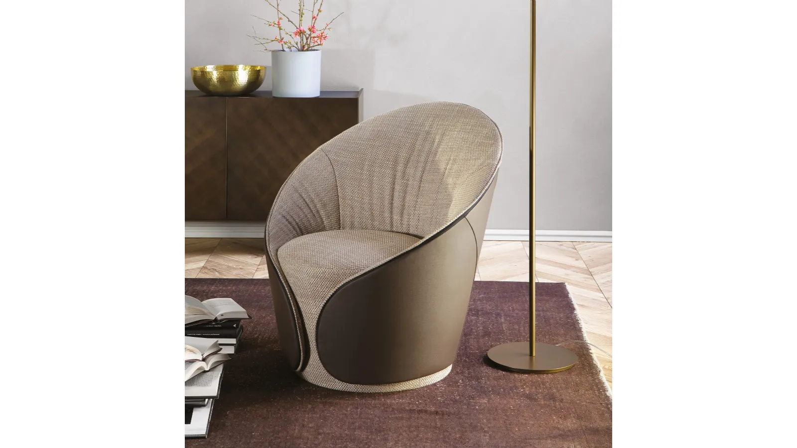Mama armchair in fabric and leather by Tonin Casa.