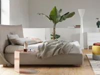 Upholstered bed in Softly fabric with a soft headboard by Calligaris.