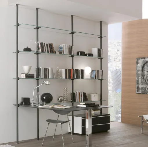 Liverpool bookcase with metal uprights and shelves and glass desk by Ponti Terenghi.