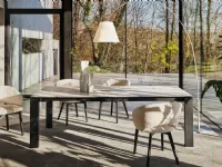 Fabric upholstered Anime chair with wooden legs by Calligaris.