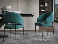 Astra chair in upholstered fabric by Tonin Casa.