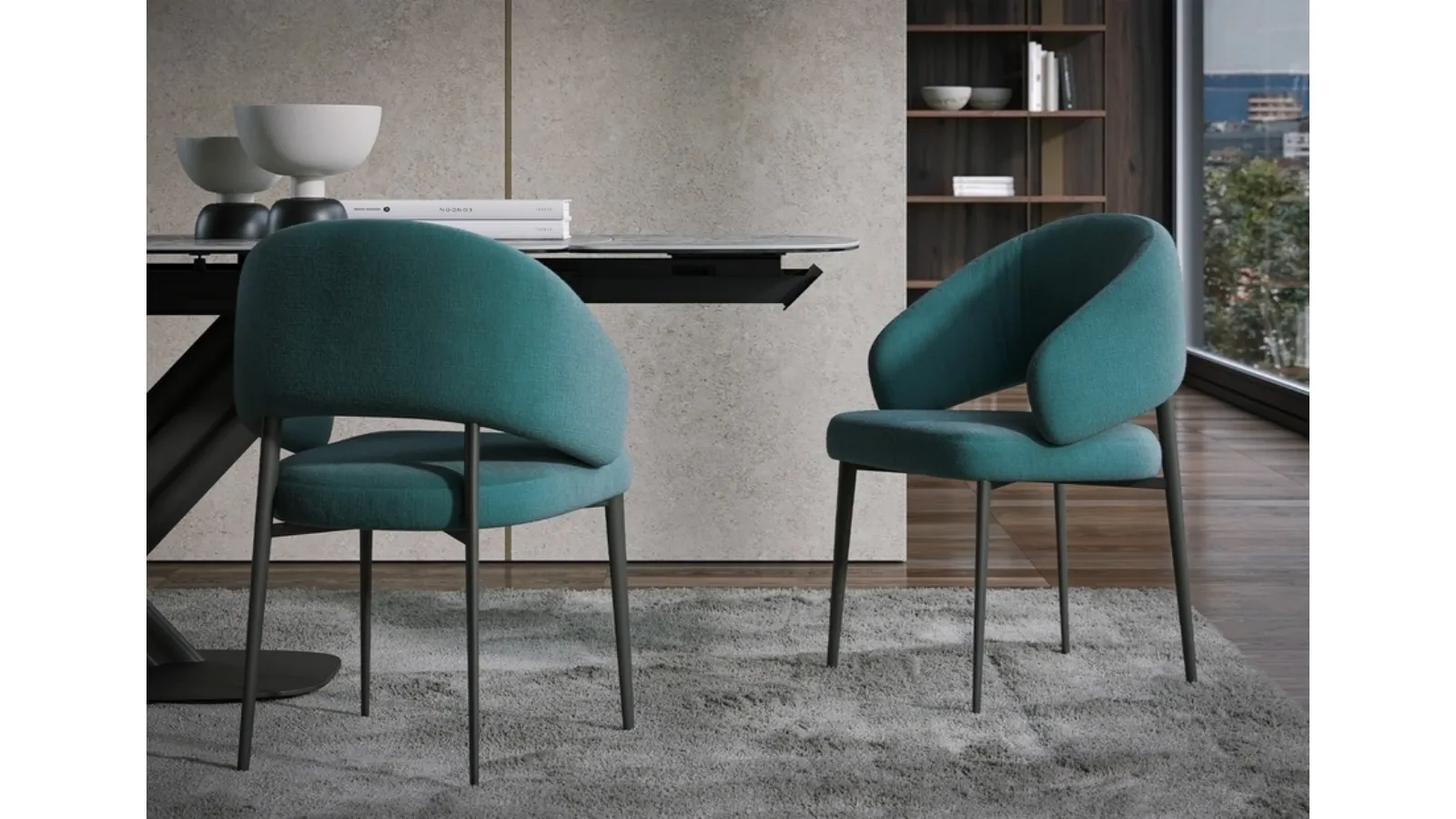 Astra chair in upholstered fabric by Tonin Casa.
