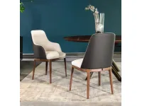 Chair with and without armrests Cleo in fabric with leather backrest by Tonin Casa.