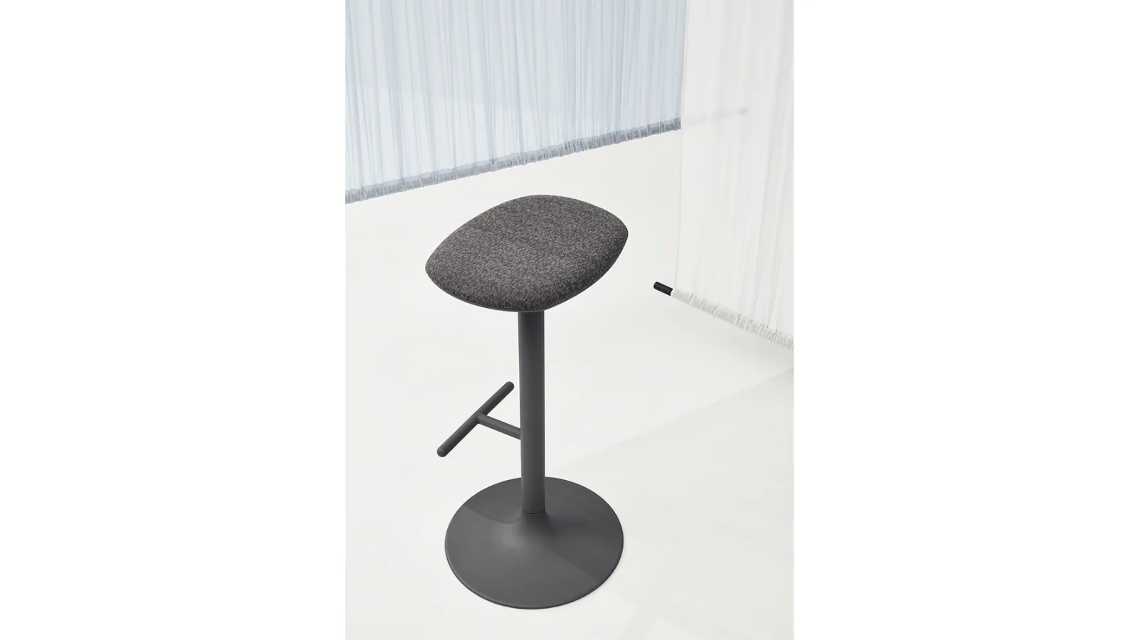 Flink Stool with upholstered fabric seat and steel base by Infiniti.