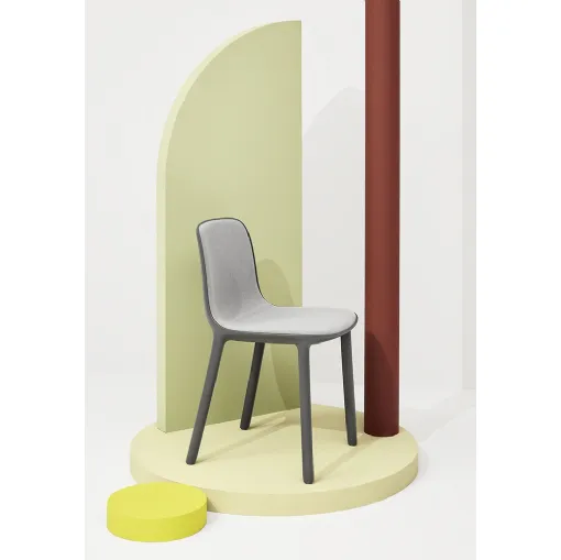 Freya chair in polypropylene with shell internally covered in Infiniti fabric.