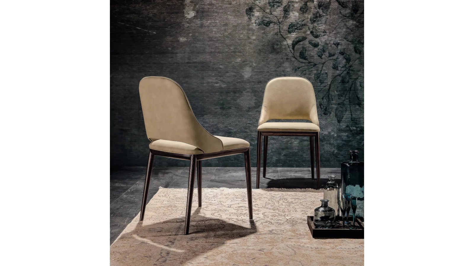 Malva chair with seat covered in leather by Tonin Casa.