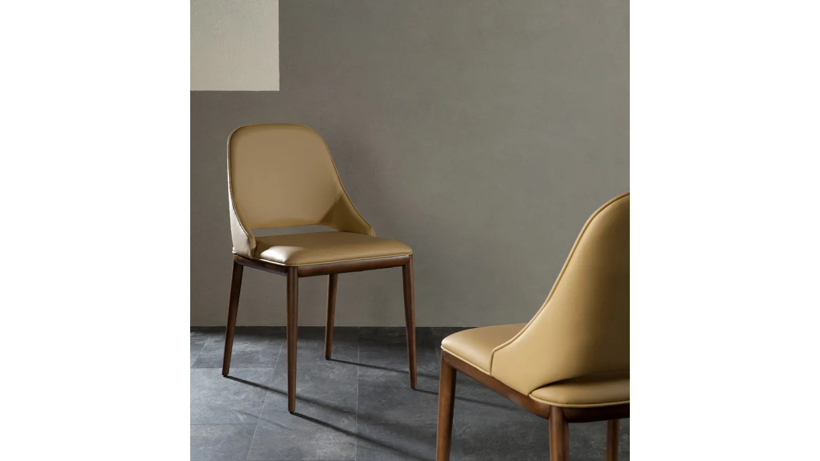 Malva chair with seat upholstered in leather by Tonin Casa