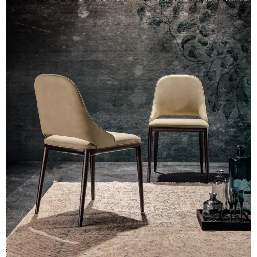 Malva chair with seat covered in leather by Tonin Casa.