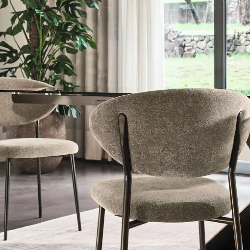 Manta upholstered fabric chair by Calligaris