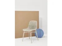 Next chair with perforated polyamide shell and solid Ash legs in Natural by Infiniti.