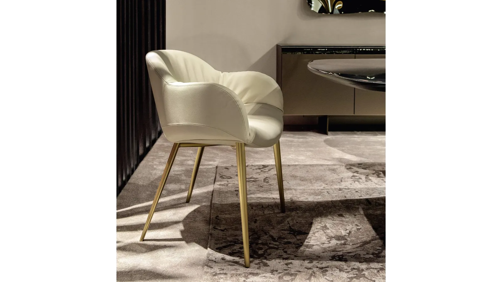 Padded leather chair Olympia by Tonin Casa.