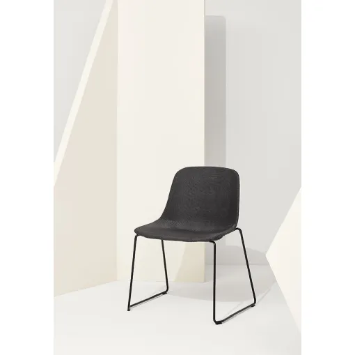 Pure Loop Maxi Sled chair with upholstered fabric shell and steel sled base by Infiniti.