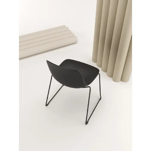 Pure Loop Mono Sled chair with polypropylene shell and steel base by Infiniti.