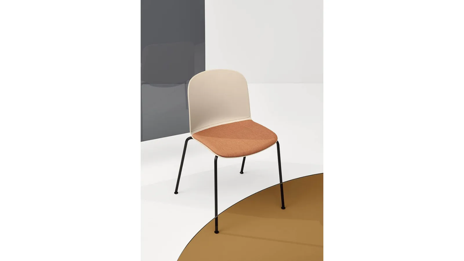 Relief 4 Legs chair in polypropylene with upholstered fabric seat and steel legs by Infiniti.