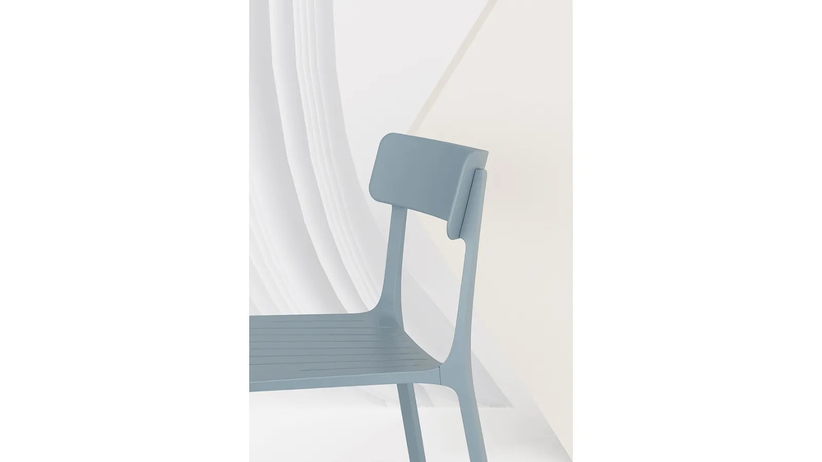Ruelle chair in aluminum with polypropylene backrest by Infiniti.