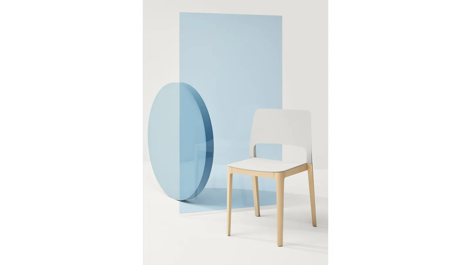 Settesusette chair in polypropylene with Natural solid Beech legs by Infiniti.