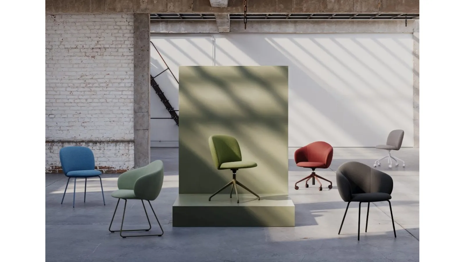 Volta chair in padded fabric by Infiniti