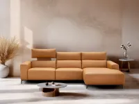 Relax leather sofa with peninsula Bertè by Franco Ferri.