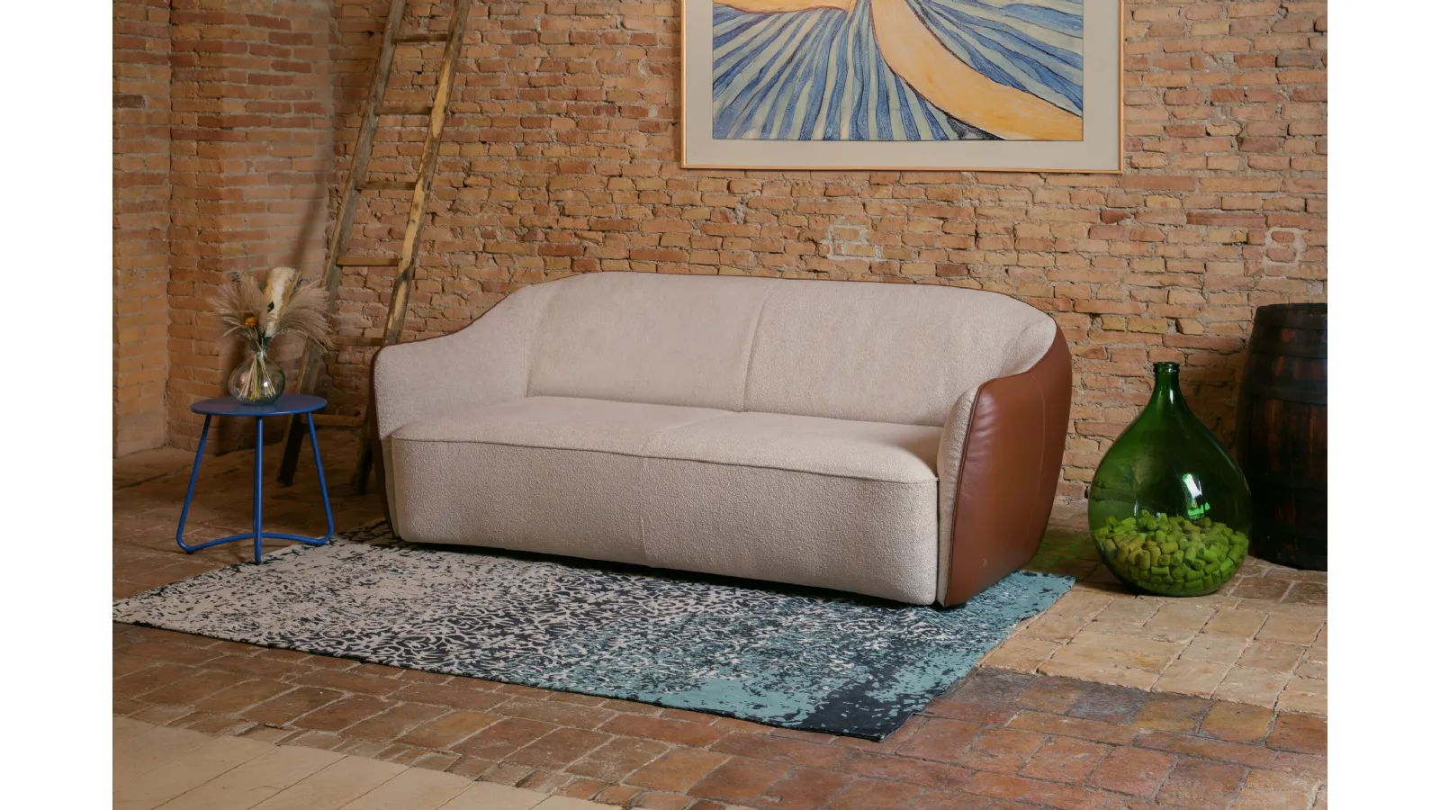 Eris linear sofa in fabric and leather by Nicoletti Home