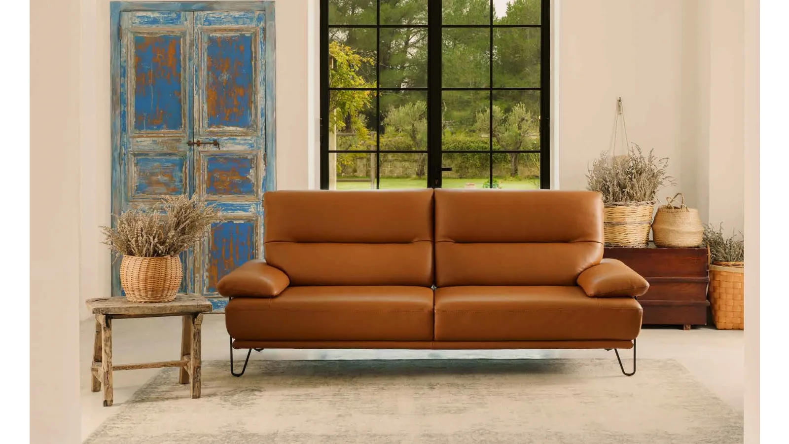 Folk Leather Sofa by Nicoletti Home.
