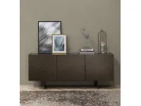 Madia coated in brushed bronze lacquer by Tonin Casa.