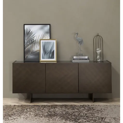 Madia coated in brushed bronze lacquer by Tonin Casa.