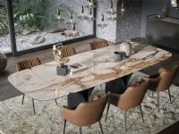 Extendable Arco Ext table in marble-effect ceramic by Tonin Casa.
