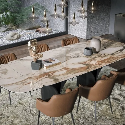 Extendable Arco Ext table in marble-effect ceramic by Tonin Casa.