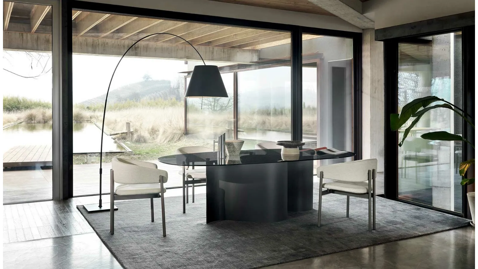 Doon table with glass top by Ditre Italia.