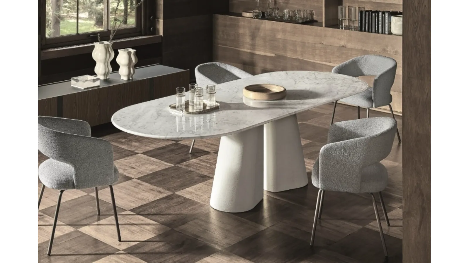 Oval Pillar table in marble and cement by Ditre Italia.