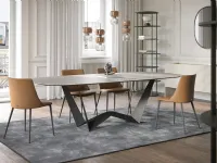 Reverse table in Travertine stoneware by Tonin Casa.