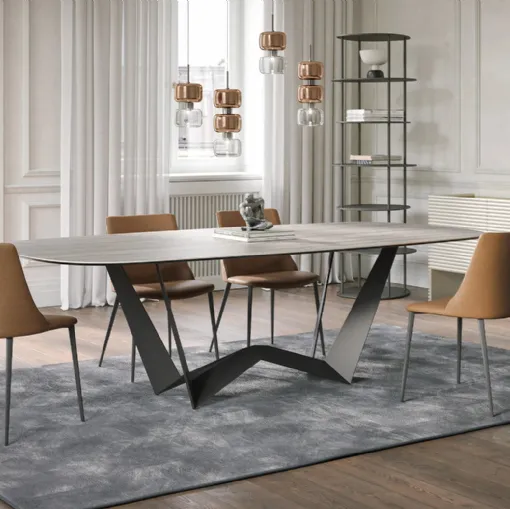 Reverse table in Travertine stoneware by Tonin Casa.