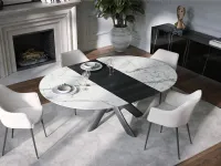 Extendable Style Round Ext table in ceramic with wooden extension by Tonin Casa.