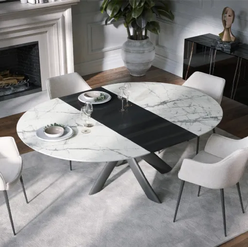 Extendable Style Round Ext table in ceramic with wooden extension by Tonin Casa.
