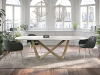 Tavolo Tenso with travertine sandstone top by Tonin Casa.