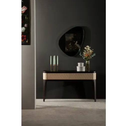 Mobile entrance console Tiffany in wood with front covered in quilted diamond pattern faux leather by Tonin Casa.