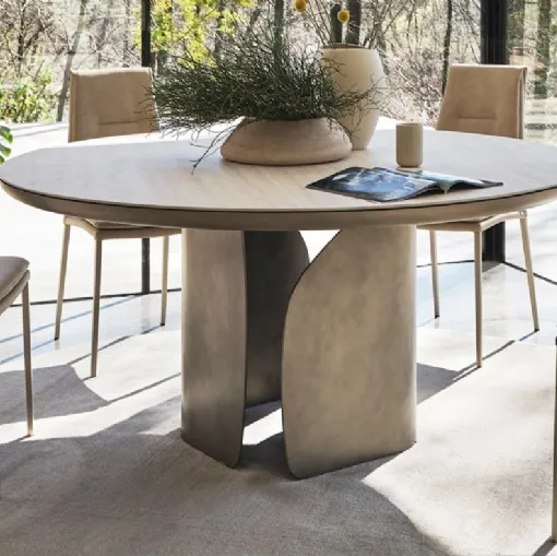 Round ceramic table Twins by Calligaris.