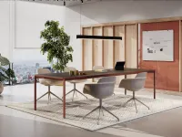 Versatile table with laminate top by Infiniti.