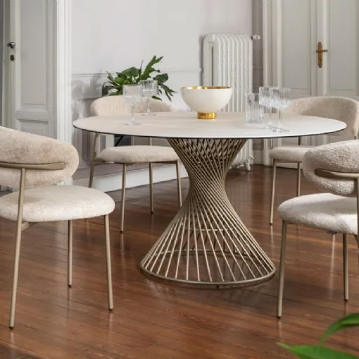 Round ceramic table Vortex by Calligaris.