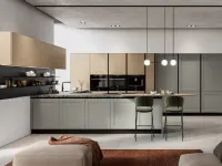 Modern kitchen with Meg 02 peninsula in lacquered and wood by Arredo3.