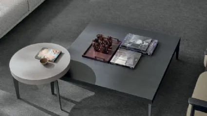 Atollo coffee table in alpaca material and charcoal oak material by Tomasella.